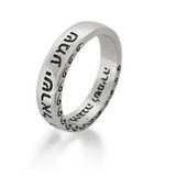 Thin decorated ring featuring a blessing , a classic unisex design made of silver.