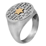 Silver signet-style ring featuring a 9K gold Star of David and the engraved inscription: “Many women have done virtuously, but you surpass them all.”