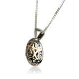 "Kingdom of David" pendant, gold and silver, set with chrysoberyl