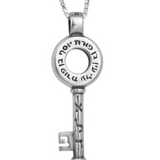 Silver pendant in the shape of a key, engraved with the phrase “Ben Porat Yosef Alei Ayin.”