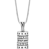 Silver pendant in the shape of a small cylinder, featuring a blessing and adorned with white zircon stones.