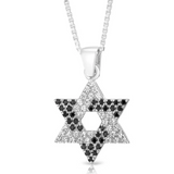 Silver pendant set with black or white zircon stones.