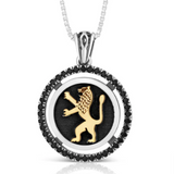 Silver pendant with a lion design, combined with gold and set with onyx stones.