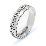 Ornamented silver ring engraved with the phrase “Ki Melachav”