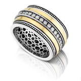 Silver ring combined with gold, featuring white zircon stones.